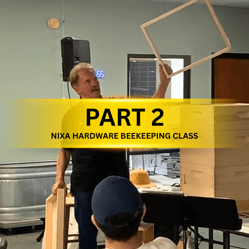 Beekeeper Dan Barton demonstrating how to inspect a hive frame for pests and brood at Nixa Hardware.